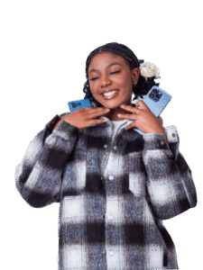 Smiling person holding two smartphones, expressing satisfaction and digital empowerment in a tech-driven lifestyle.”