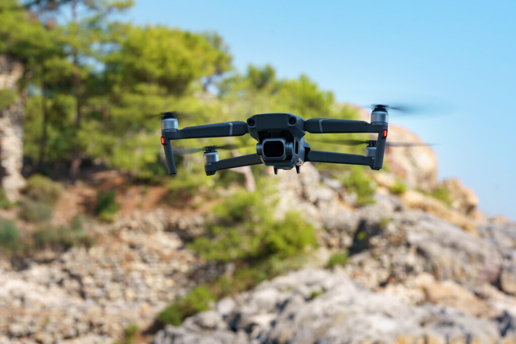flying drone on mountain background